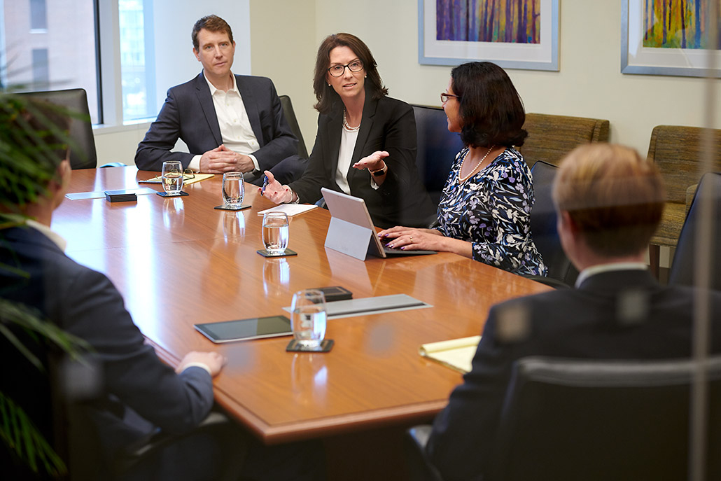 Birch Hill Advisors chatting around conference table